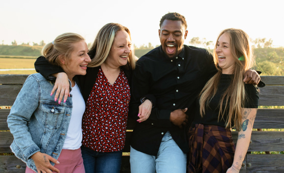 4 addiction treatment experts standing together